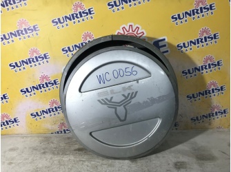 Продажа Колпак запасного колеса на SUZUKI JIMNY JB43W    -  
				серебро wc0056